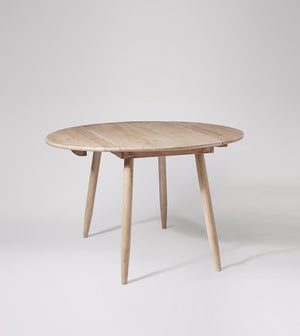 Rond way Solid Wood Dining Table in Natural Finish